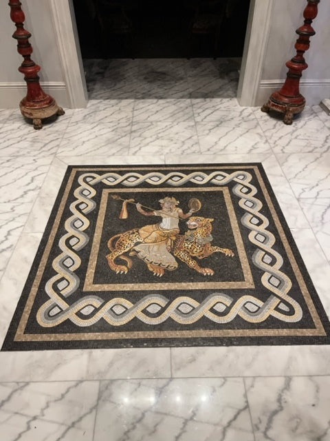 Roman mosaic of Dionysus riding a tiger, installed in an entryway