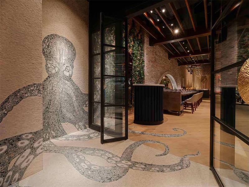 Octopus marble mosaic floor at a restaurant entrance